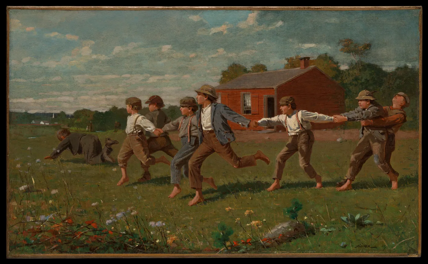 A line of barefoot boys holding hands races across a grassy meadow in front of a red one-room schoolhouse.