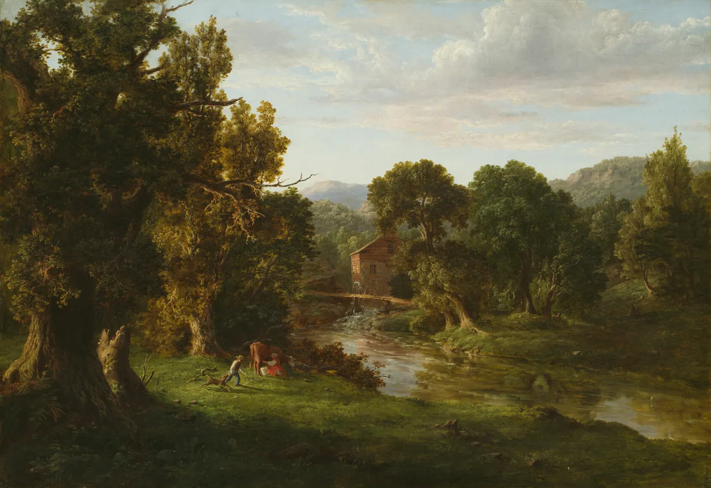 A red mill beside a winding stream under tall trees, with figures resting on a sunlit meadow and hills beyond