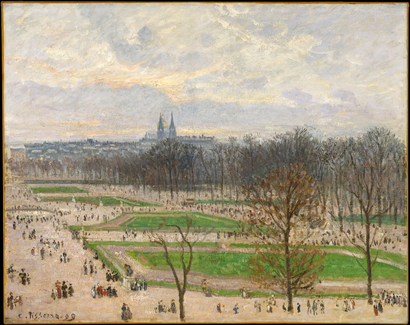 High view over the Tuileries garden in winter, with bare trees, green lawns, strolling crowds and distant Paris spires under a pale sky